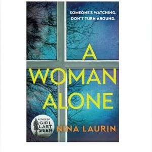 A Woman Alone by Nina Laurin paperback book